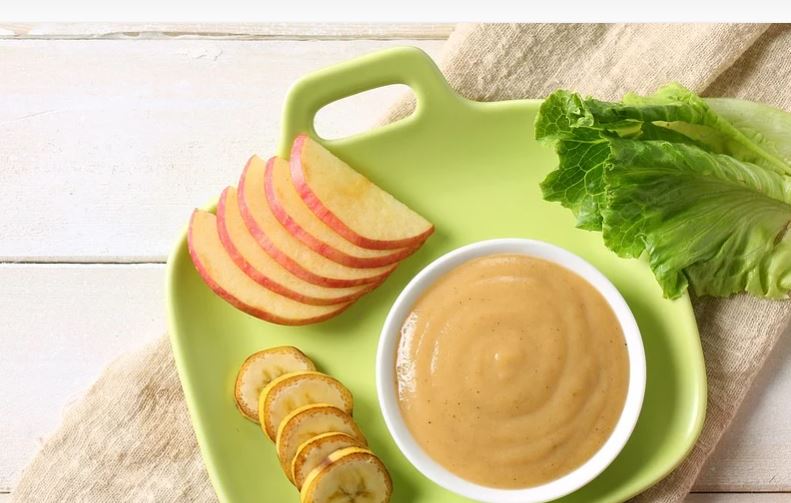 close up of baby food r/t single mom.